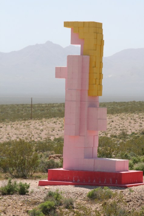 Another view of the lady displaying her bubble butt.