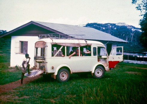 Local Peace Corps Volunteers hired a money-bus to take us to the Haight-Ashbury party. The bus sits in front of our house in this photo.