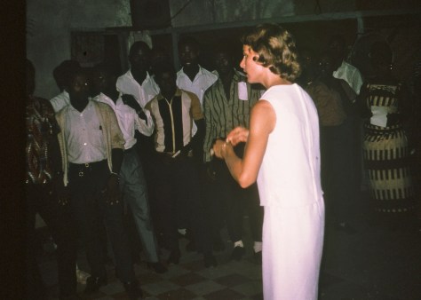 Jo Ann directing her Gboveh High School chorus. At Berkeley, she had belonged to the University's elite Glee Club.
