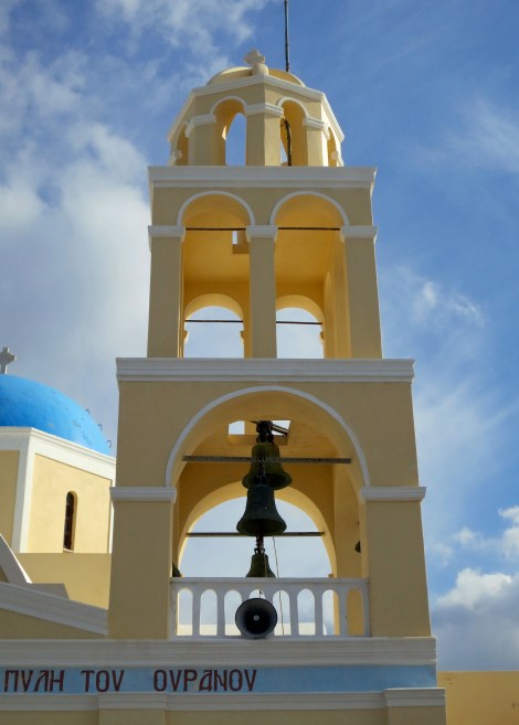 This is a close up of the bell tower on the Church of St. George in Oia, Santorini. The bell towers throught the town were as unique as the churches.