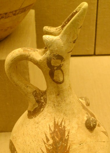 Here's another favorite Akrotiri artifact of mine. It's called a nipple ewer (or pitcher) for obvious reasons. This one comes with tiny breasts, ear rings and a beak. Archeologists speculate that the ewer may have had religious significance. My wife Peggy, always practical, suggests that may have been used like baby bottles.