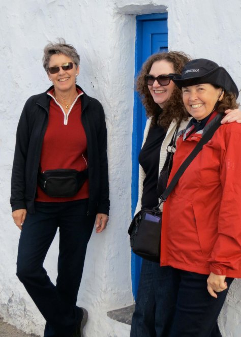My wife Peggy on the right and two of our traveling companions, Kathi and Frances stand in front of another blue door.