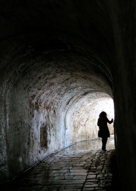 The most magical place for me in Corfu was the Old Fortress. Dating back to ancient times, the Venetians updated it in the Fourteenth Century. In this photo, Kathi Saage walks around a corner of one of the tunnels leading through the fort.