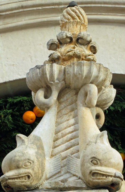 The top of Little Onofrio's Fountain with its ferocious looking fish. The fountain is located near the clock tower in Dubrovnik, Croatia.