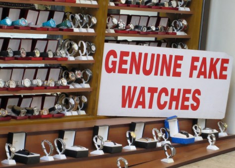 I was amused by this shop that offered genuinely fake watches... truth in advertising.