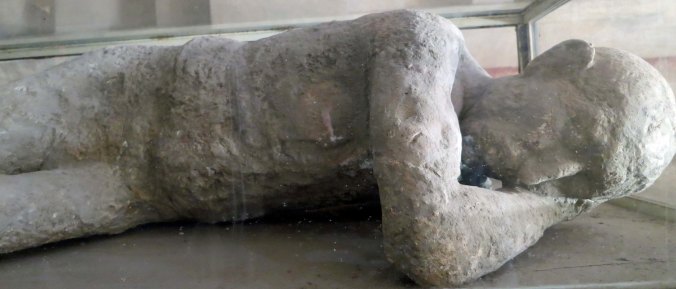 This plaster cast of a body found in Pompeii looks the man merely went to sleep.
