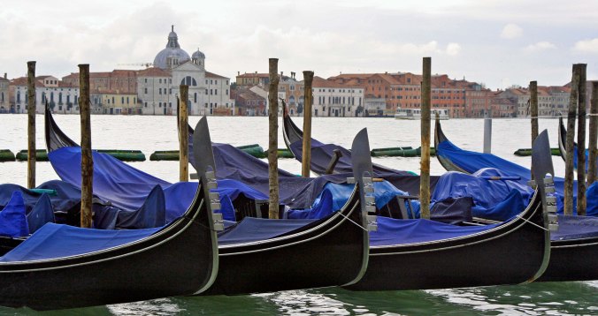 Peggy took this photo of parked gondolas looking from Venice proper across at the island of La Giudecca
