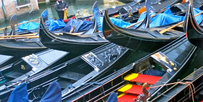 This is a sight you wouldn't see during the summer when these gondolas would be filled with tourists. I thought of the gathered gondolas as a gondola parking lot.