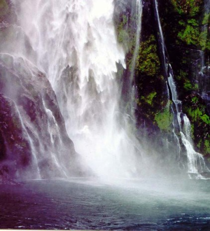 A whole world waits for us outside our door... including this waterfall in Milford Sound, New Zealand.