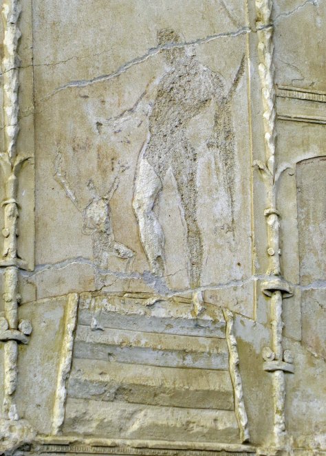 This close up of the wall featuring a father and child in Pompeii, shows a 3-D effect.