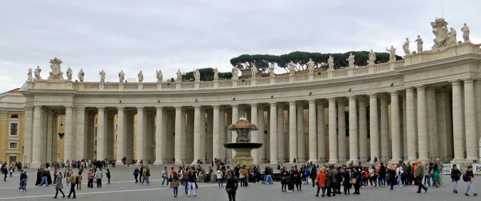 A view of St. Peter's Square featuring Bernini's columns that enclose the square.