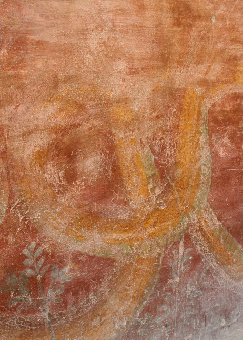 I close with what, at first, appears to be abstract art but was actually a coiled snake. It had an interesting story. Our guide told us snakes were painted on the walls to keep men from urinating on them. Apparently peeing on the snake brought bad luck.