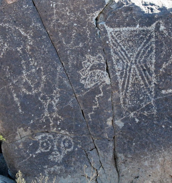 Cloud, lightning and sun petroglyph at Three Rivers Petroglyph site in New Mexico.