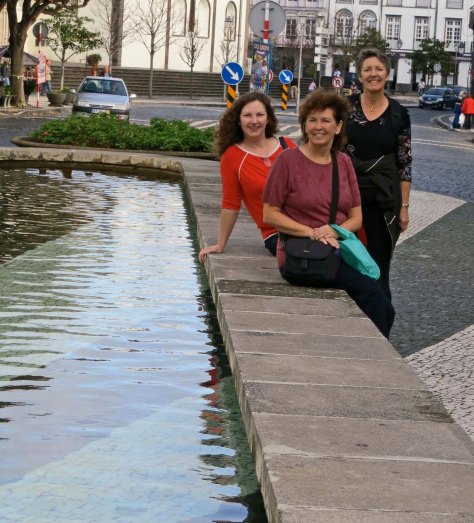 Peggy, Kathi and Frances take a break at the pool's edge.