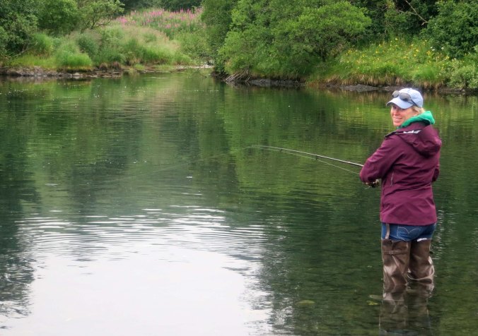 Cammie demonstrates her salmon fishing skills.