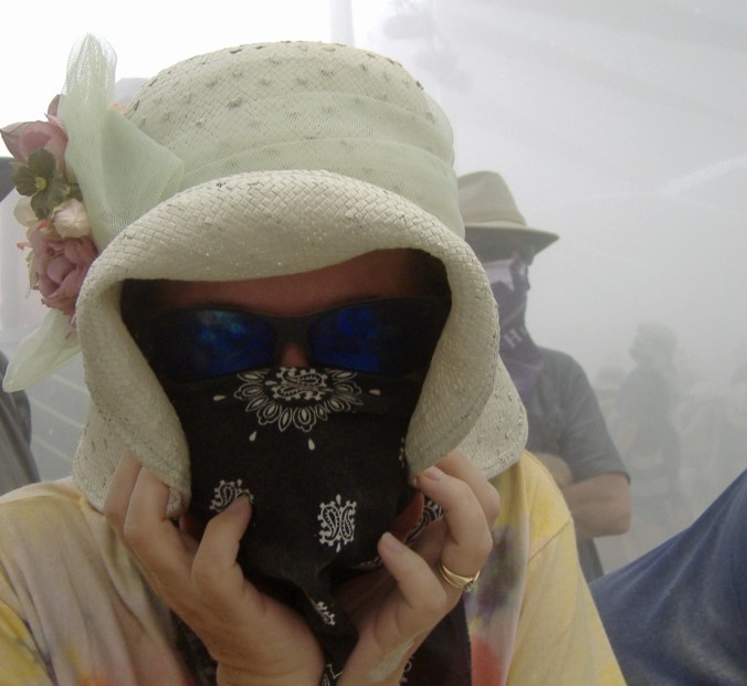 Dust storm invades Center Camp at Burning Man.