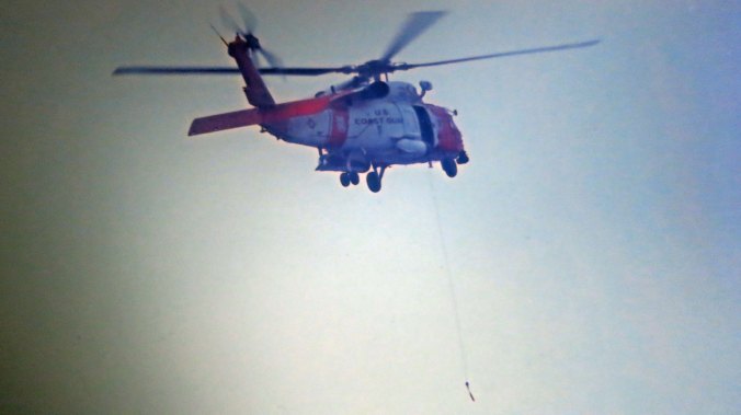 In addition to their regular assignment to Kodiak, Coast Guard H-60 pilots are also assigned to remote areas for one to three week tours. In this photo, Tony flies his H-60 over the remote island of St. Paul north of the Aleutian Island chain halfway between Alaska and Siberia.