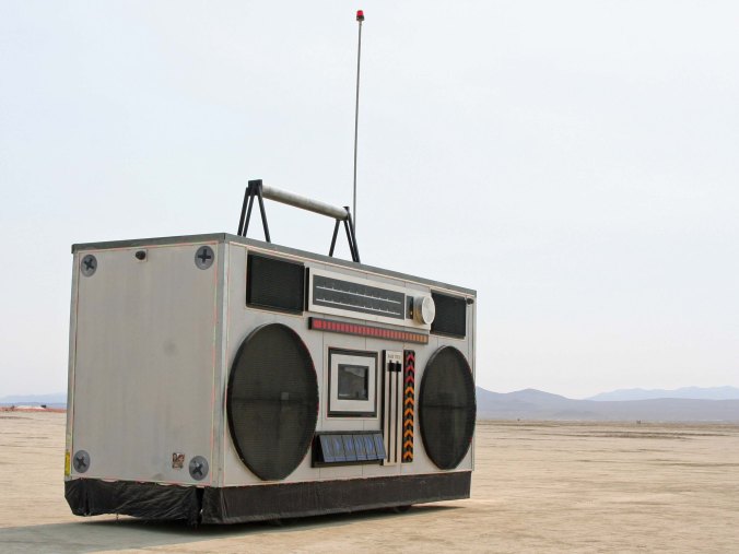 I couldn't capture the fast moving lowrider, but we did find a 15 foot high boombox wandering the Playa as a mutant vehicle. (Photo by Peggy Mekemson.)