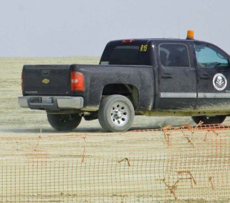 It was the feared BR 15, the truck with the skull and crossbones. A prodigious leap took me back across the fence. Who says white boys can't jump... even 70 year old white boys. "Hey, you can't do that." the voice of the law called after me. "You're too late," I called back. "I have already been out and beyond and returned."