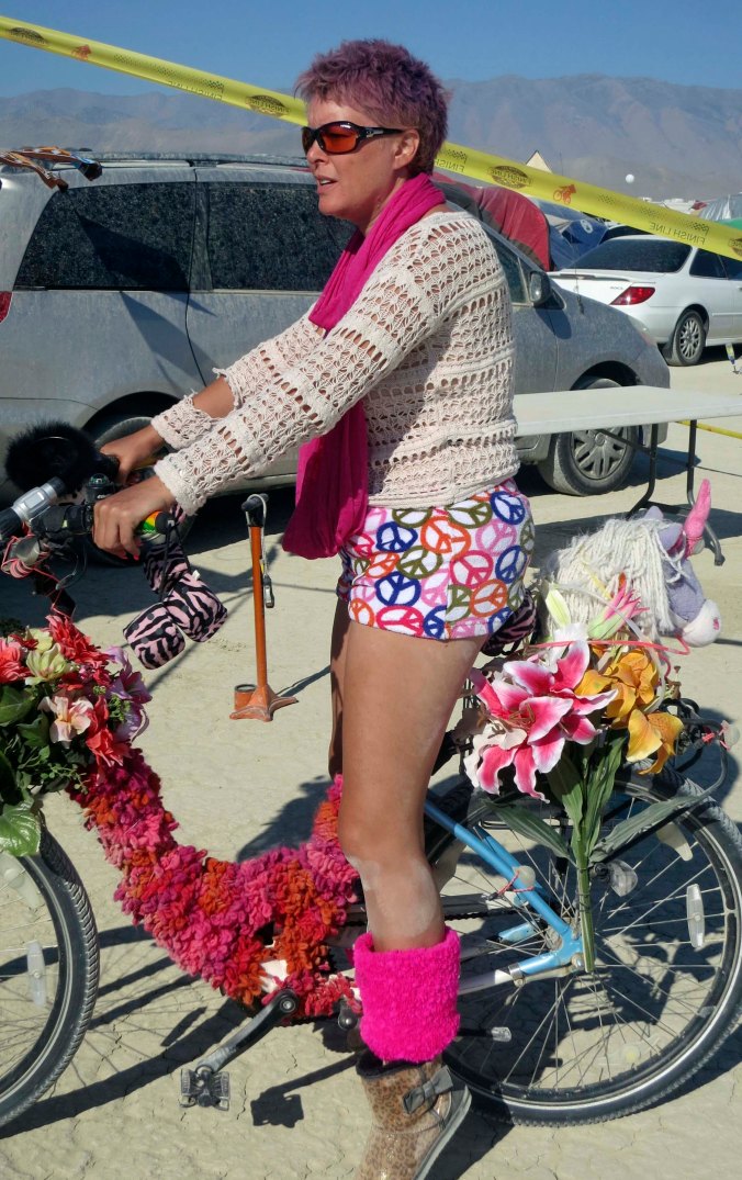 This is Punkin, who owns a bike shop in Davis, California. She had her decorated bike in the window of the shop for the month preceding Burning Man.