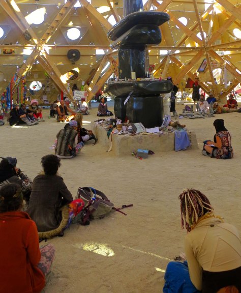 Black Rock City residents quietly meditate in the Temple of Whollyness at Burning Man 2013.