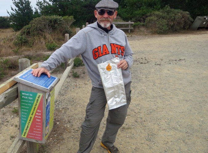 Bags provided for picking up trash on Limantour Beach at Pt. Reyes National Seashore. Photo by Curtis Mekemson