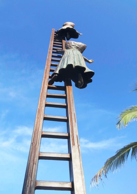 Sculpture in Puerta Vallarta by Sergio Bustamante. Photo by Curtis Mekemson.
