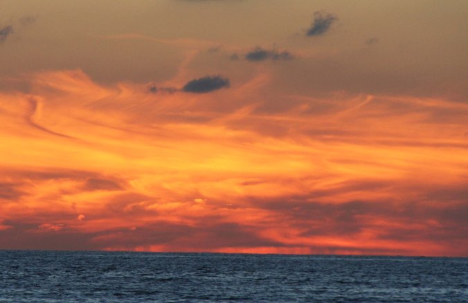 Sometimes the colors of a sunset are so vivid they seem unreal. (Photo by Peggy Mekemson.)