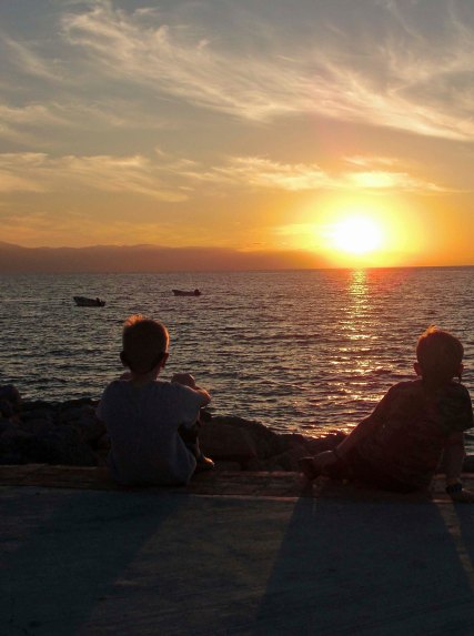 Our grandkids Ethan and Cody joined us in downtown Puerto Vallarta to catch the sunset. (Photo by Natasha Cox.)