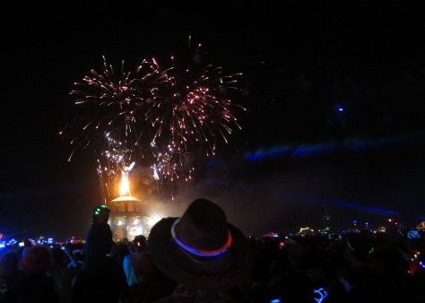 Fireworks provide a sendoff to the burning Man.