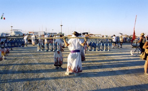 Burning Man has numerous opportunities to volunteer, such as being a lamplighter and helping to light the hundreds of lamps that adorn the night.