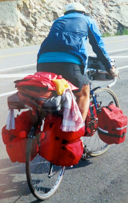 Ever wonder what it takes to bicycle 10,000 miles? One of my friends has suggested strong legs and a weak mind. I was half way through my trip bicycling up a very steep hill in Nova Scotia when this photo was taken.