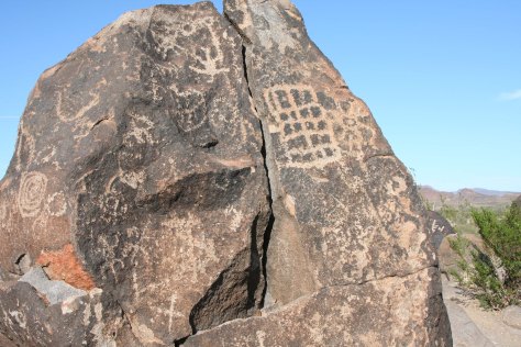 The grid on this rock is another example of archaic petroglyphs. There is some suggestion that the grid represents a rough map and the dots represent where people lived.