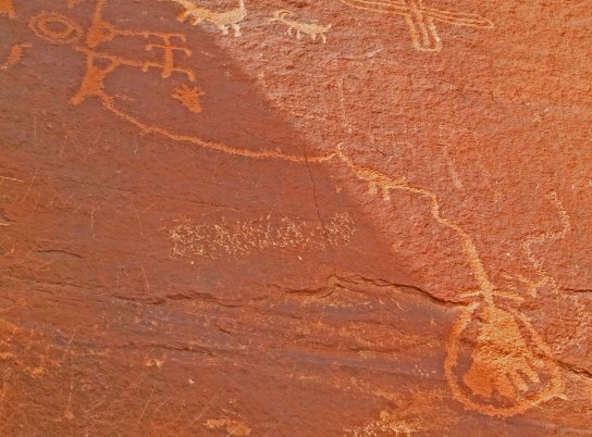 Petroglyph showing use of an atlatl at Valley of Fire State Park near Las Vegas, Nevada.