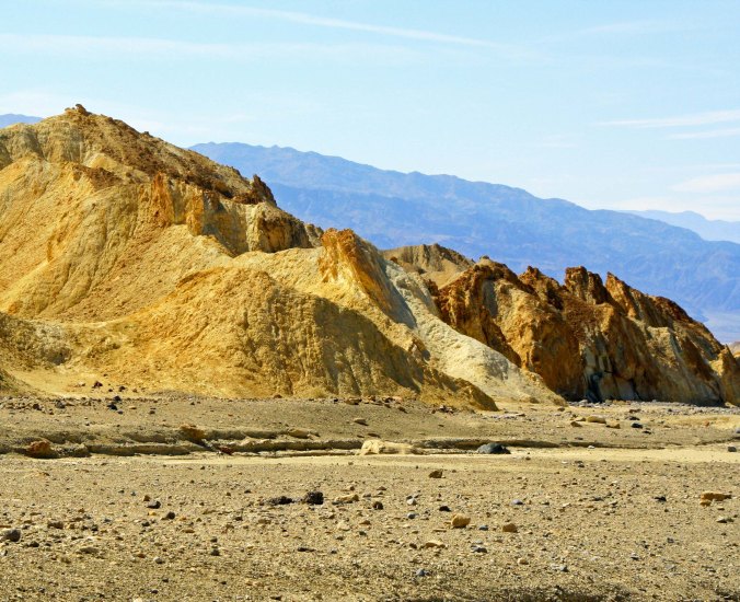 Distant mountains appear purple in Twenty Mule Team Canyon, Death Valley.