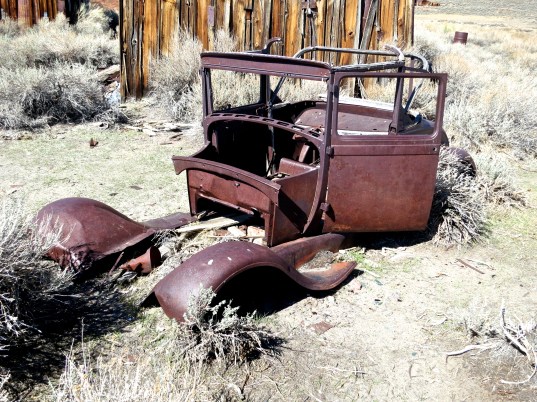 Old car remains at Bodie State Historical Park in California.