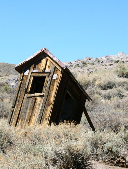 Propped up outhouse in the ghost town of Bodie, California.