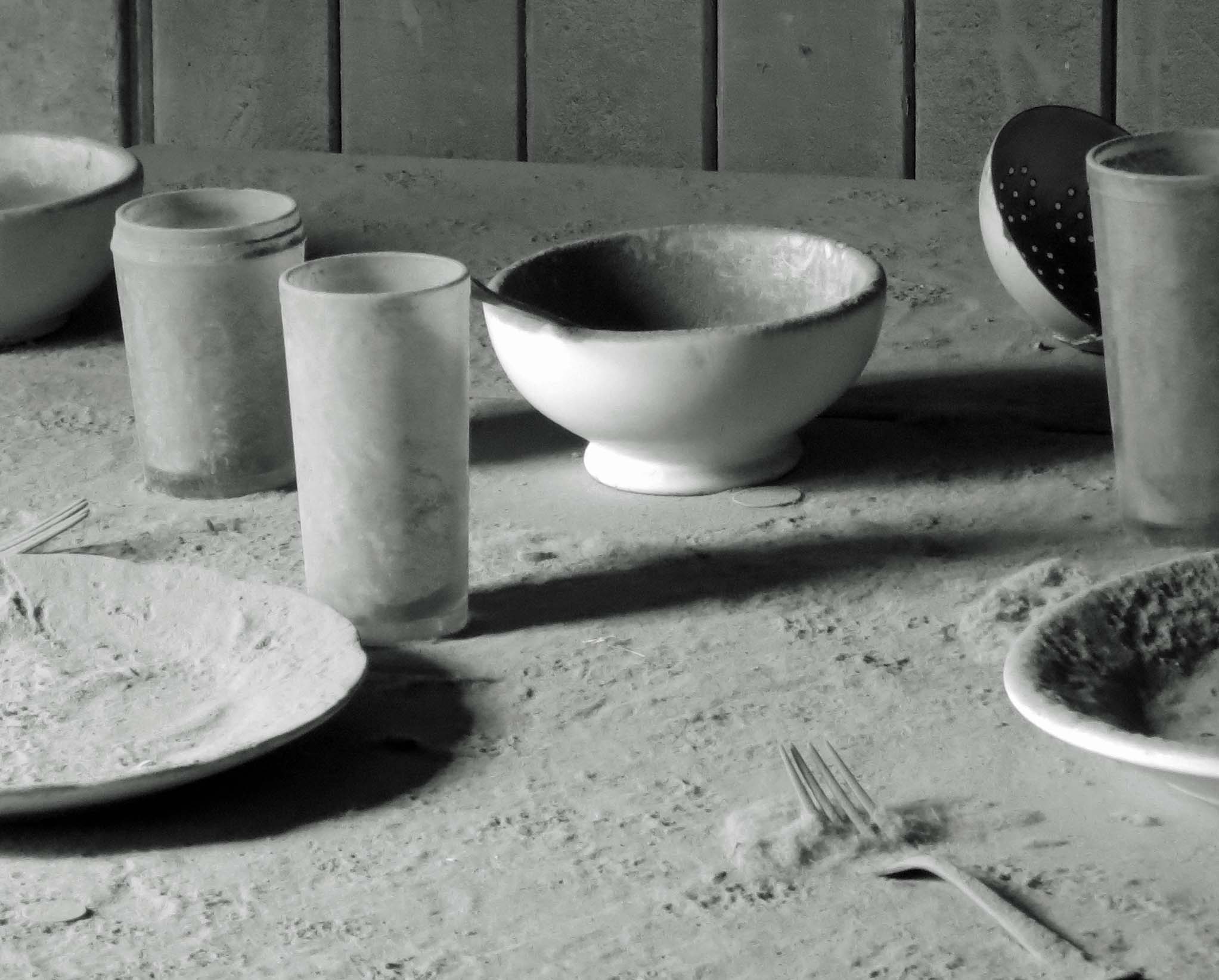 Place setting covered in dust at Bodie State Historical Park.