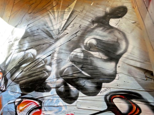 Mural sized art inside the head of the Embrace the Dawn sculpture at Burning Man 2014. Photo by Curtis Mekemson. 