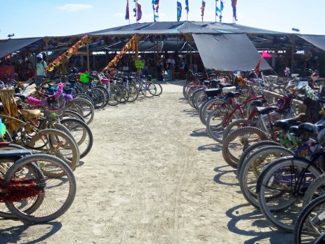 Bikes parked in front of the Center Camp Cafe at Burning Man 2014.
