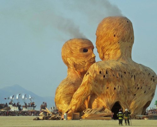 The beginning of the burn of Embrace the Dawn at Burning Man 2014. Photo by Curtis Mekemson.