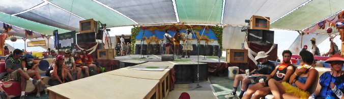 One of the best places to catch some of Burning Man's wilder costumes is to attend the annual fashion show hosted by the Center Camp Cafe. While it may not be New York or Paris, it does come with a runway. (Photo by Don Green.)