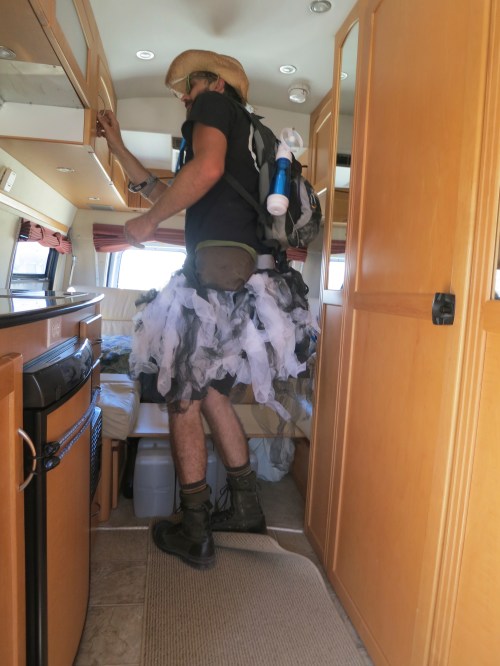 Ticket checkers search for non-ticketed Burners at Burning Man 2014.