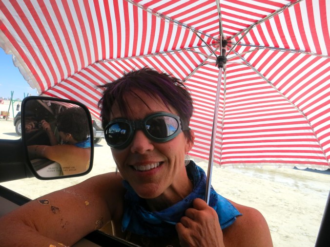 Burners are welcomed to Burning Man by a wild group of volunteers who withstand wind, dust, and sun to make sure that Burners are greeted enthusiastically.