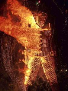 A close up of the Man burning at Burning Man 2014.