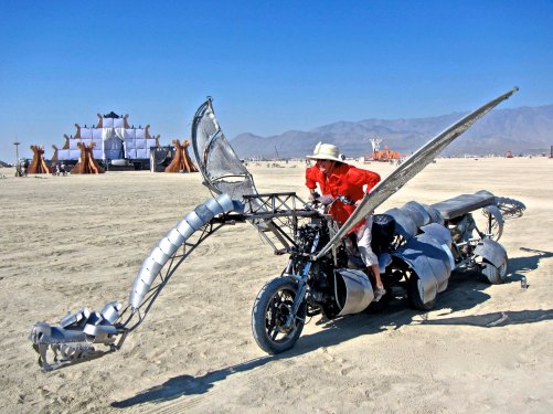 Peggy found this dragon out on the Playa while the owners were away. Good thing they didn't leave the keys. (Photo by Tom Lovering.)