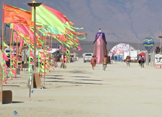 It's time to wrap up this blog and I've put this off long enough. The Divine Masculine is set off by flags as a truck provides perspective. A pair of Burners enjoy the view from the top. 