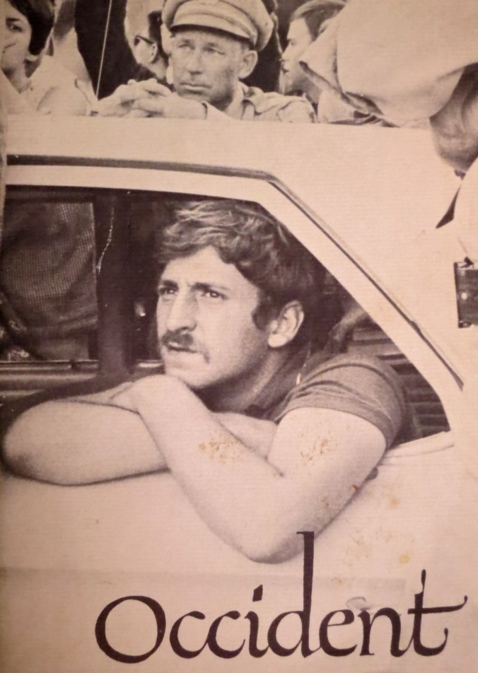 Jack Weinberg looks out the window of a police car on Sproul Plaza on the Berkeley Campus. 