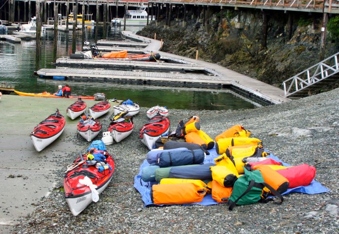 Sea kayaks wait for the next Sea Kayak Adventure tour group in Telegraph Cove.