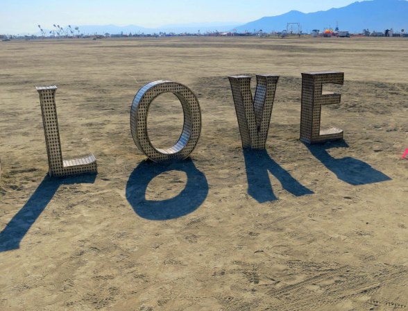 Shadowy love at Burning Man 2014. Photo by Curtis Mekemson.